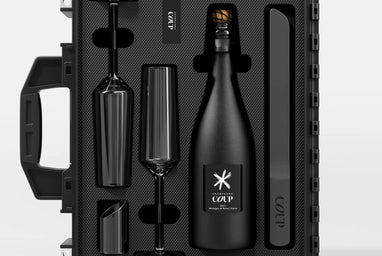 Personalized COUP bottle in a premium presentation case for client gifting