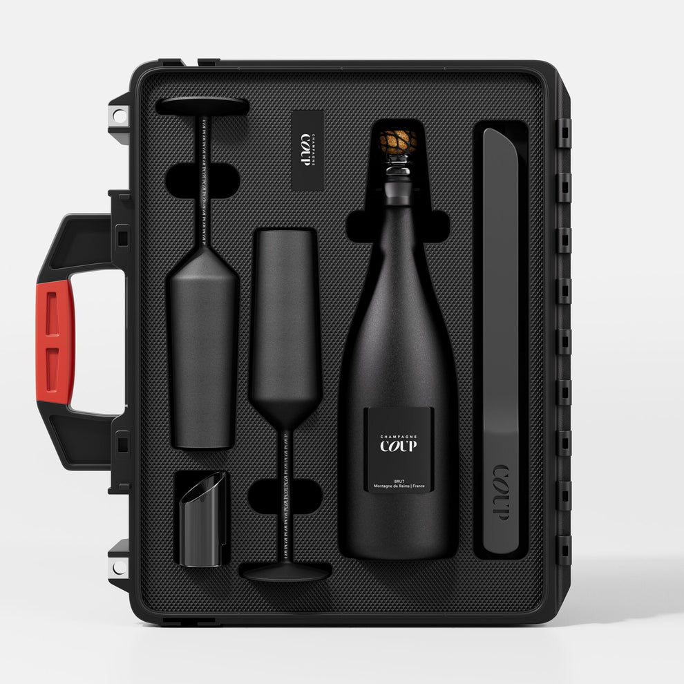 COUP Supreme Red Case luxury champagne gift case with flutes saber and refined celebratory presentation